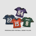 Load image into Gallery viewer, Four different type of Personalized Football Jersey Pillow with different designs on a white surface
